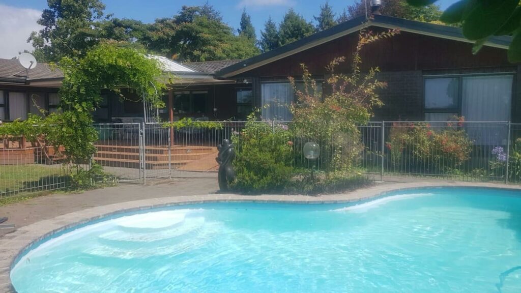 The fenced pool and garden