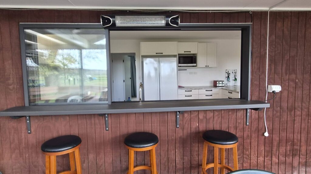 Servery window and outdoor bar stools