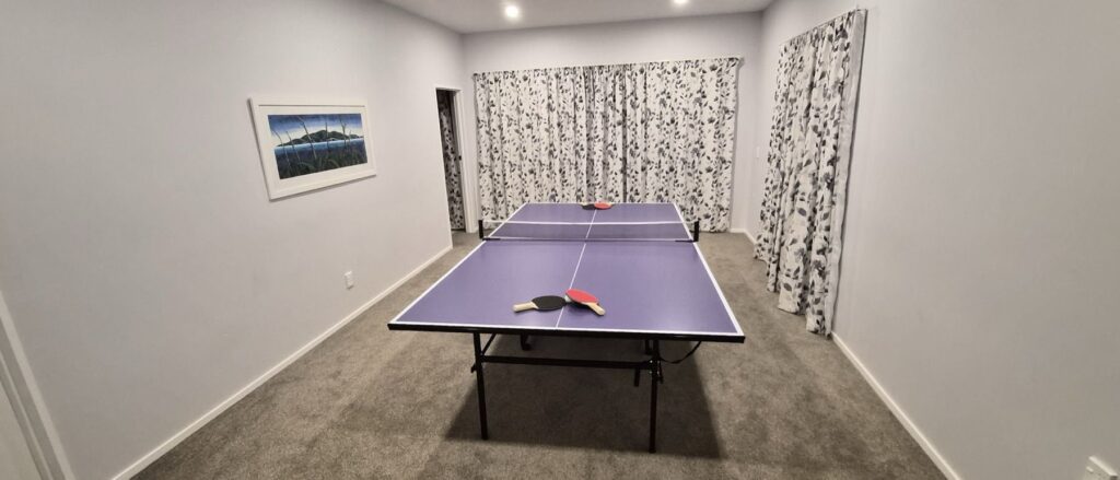 Games room with a table tennis table